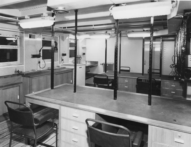 Black and white photograph showing interior of  the Discovery