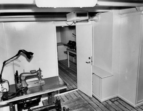 Black and white photograph showing interior of  the Discovery