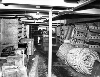 Black and white photograph showing interior of  the Discovery