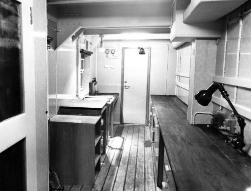 Black and white photograph showing interior of  the Discovery