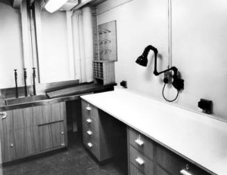 Black and white photograph showing interior of  the Discovery