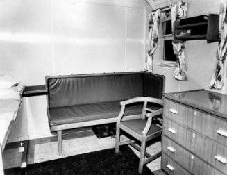 Black and white photograph showing interior of  the Discovery