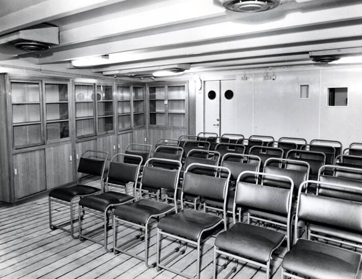Black and white photograph showing interior of  the Discovery