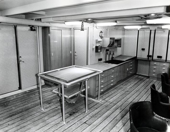 Black and white photograph showing interior of  the Discovery
