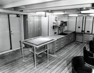 Black and white photograph showing interior of  the Discovery