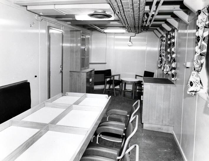 Black and white photograph showing interior of  the Discovery