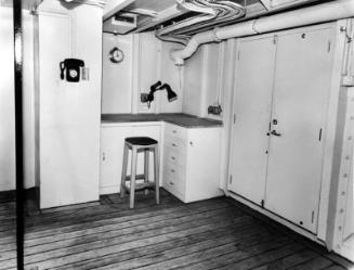 Black and white photograph showing interior of  the Discovery