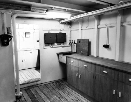 Black and white photograph showing interior of  the Discovery