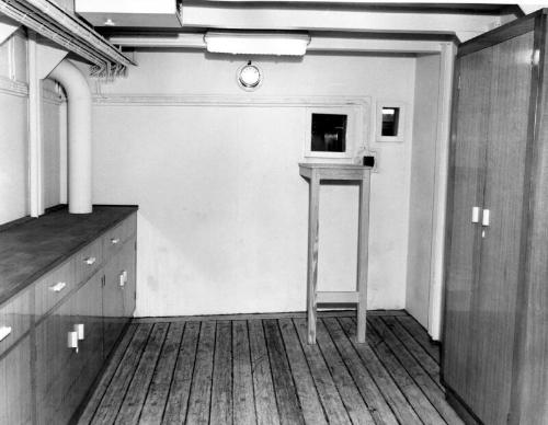 Black and white photograph showing interior of  the Discovery