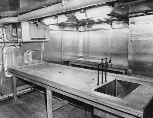 Black and white photograph showing interior of  the Discovery