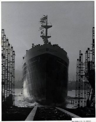 Black and white showing Launch of Motor Molasses Carrier 'Rona' at Hall Russell in 1957