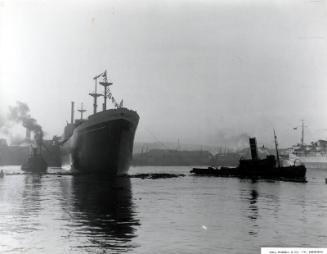 Black and white showing Launch of Motor Molasses Carrier 'Rona' at Hall Russell in 1957