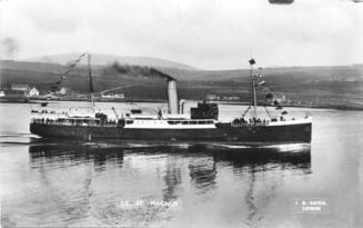 Black and white postcard showing St Magnus (III) leaving Lerwick harbour carrying orkney inter- county sports teams, 1938