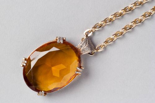 Yellow Metal and Amber Stone Pendant