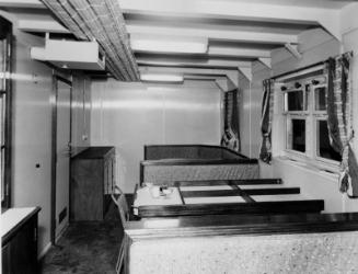 Black and white photograph showing interior of  the Discovery