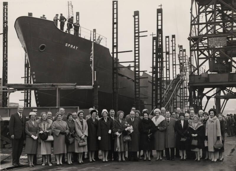 Black and white photograph showing guests at launch of 'spray'