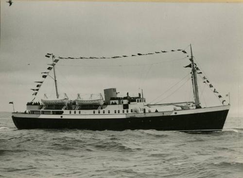 St Ola (II) under way dressed over all