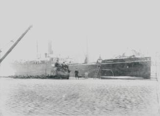 Black and white photograph showing the Duthie built and owned Steamship 'Telephone' at the Quay…