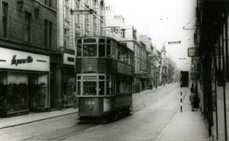 Postcard showing a tramway on a street in Aberdeen