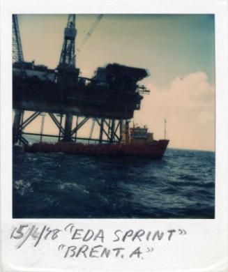 Colour Photograph Showing The Supply Vessel 'Edda Sprint' Alongside 'Brent Alpha' Platform