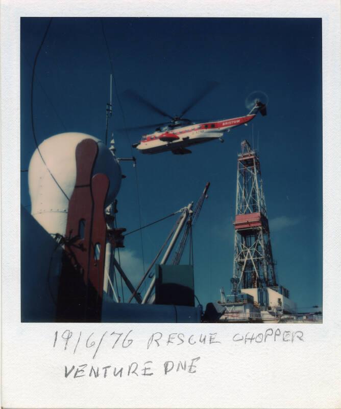 Colour Photograph Showing The Semi-Sub 'Venture One' With A Rescue Helicopter Overhead