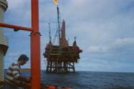 Colour photograph of Murchison Platform with boom flaring