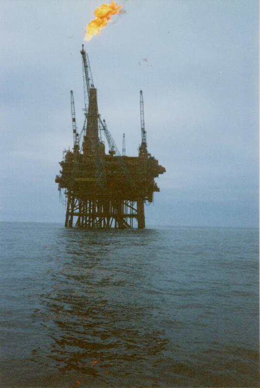 Colour photograph of Murchison Platform with boom flaring