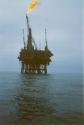 Colour photograph of Murchison Platform with boom flaring