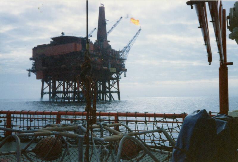 Colour photograph of Murchison Platform with boom flaring