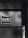 A Door with Several Signs On, Black & White Photograph by Fay Godwin
