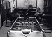 People Sitting Talking in A Rec Room, Black & White Photograph by Fay Godwin
