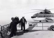 Men leaving a Helicopter, Black & White Photograph by Fay Godwin.