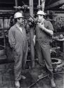 Two Workmen, Black & White Photograph by Fay Godwin.