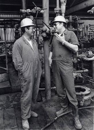 Two Workmen, Black & White Photograph by Fay Godwin.