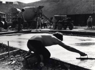 Man Working, Black & White Photograph by Fay Godwin.
