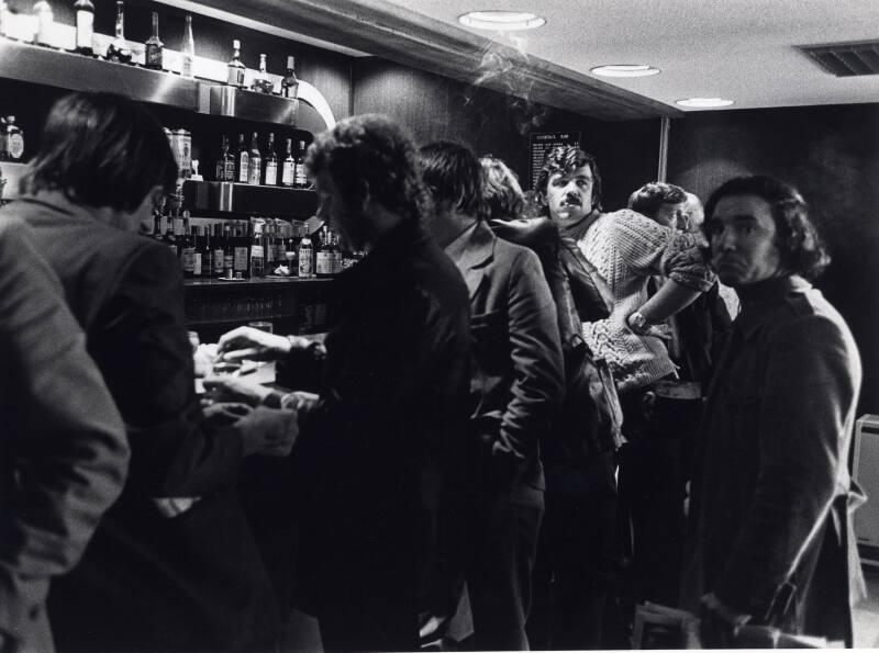 Men at a Bar, Black & White Photograph by Fay Godwin
