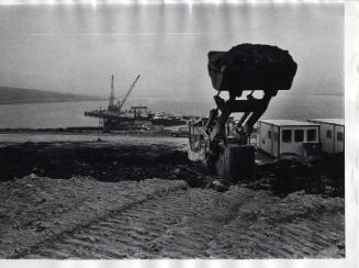 Digger at harbour Black & White Photograph by Fay Godwin