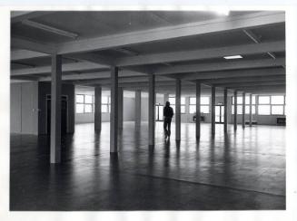 Man Walking Through Building Black & White Photograph by Fay Godwin