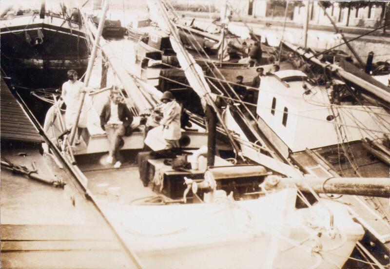 Family on a Boat (Photograph Album Belonging to James McBey)