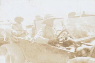 Figures in a Vehicle (Photograph Album Belonging to James McBey)