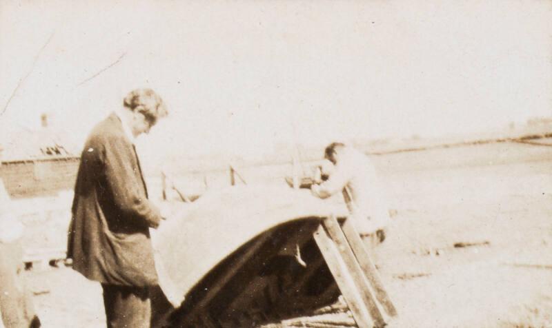 James McBey Working on a Boat (Photograph Album Belonging to James McBey)