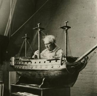 James McBey Working on his Rigging Dockyard Model (Photographs of James McBey)