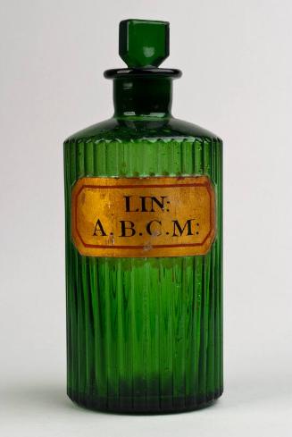 Green Glass Gold Labelled Poison Shop Round LIN: A. B. C. M: