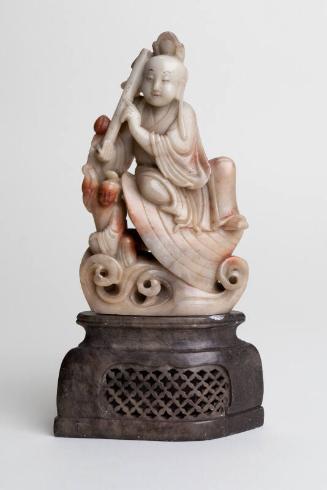 Carved Figure of Chinese Immortal Han Xiang Zi with Flute and Stand