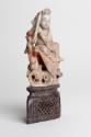 Carved Figure of Chinese Immortal Han Xiang Zi with Flute and Stand