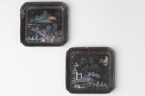 Pair of Chinese Black Lac Burgauté Dishes with Garden Scenes