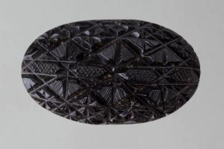 Black Oval Mourning Brooch with Faceted Design