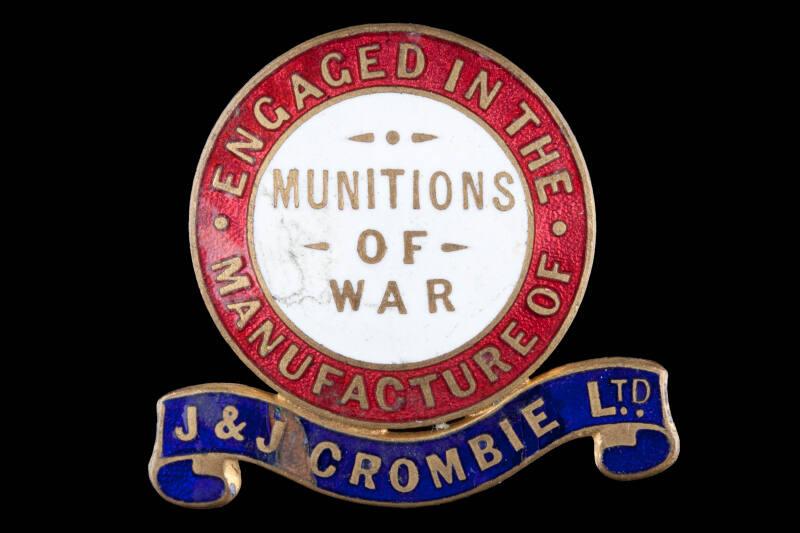 Enamelled Lapel Badge:Engaged in the Manufacture of  Munitions of War J. & J. Crombie