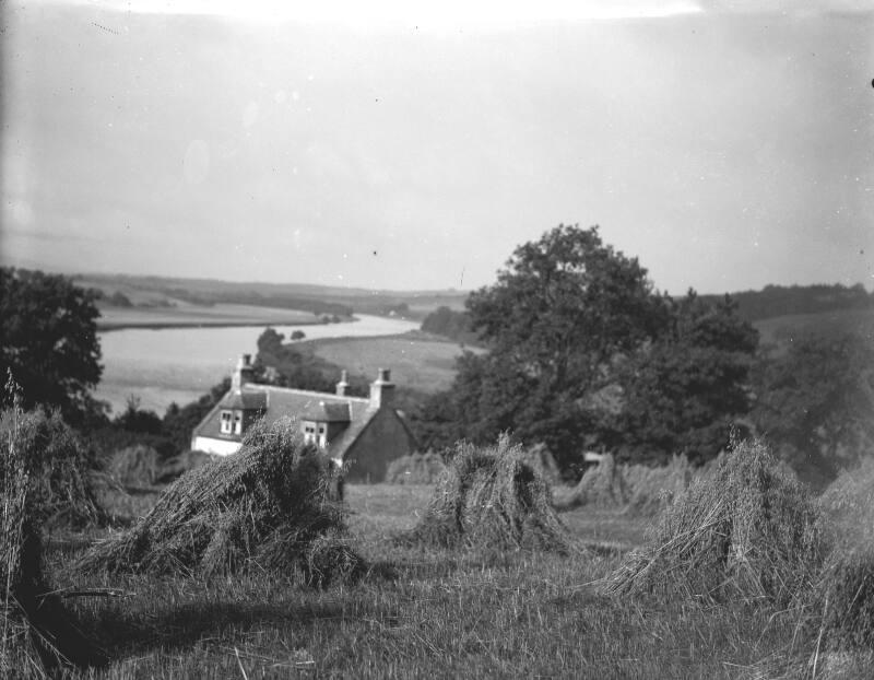 Looking to Farmhouse with Stooks 
