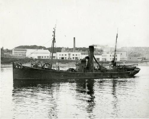 Black and white photograph Showing Port Side Of Trawler A47 'strathleven' Leaving Aberdeen Harbour